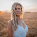 white-dress-gray-eyes-hair-in-face-4k-gx.jpg