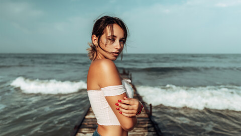 women-arm-crossed-pier-side-4k-be-3840x2160.jpg