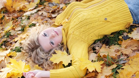 girl autumn blonde blue eyes sweater leaves.jpg